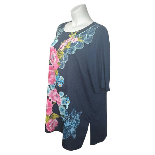 Navy blue shirt with floral designs on a white background