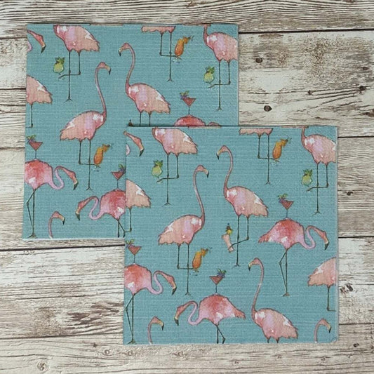 Pink flamingo sipping cocktails cocktail size decoupage napkins with tropical beach summer design displayed