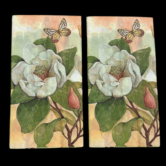 Two Guest size decoupage napkin featuring white magnolia flowers, green leaves, and a butterfly on a soft background, ideal for floral crafts and spring decor.