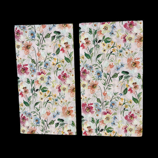 Two Guest size decoupage napkin featuring watercolor flowers in pink, rose, blue, and yellow on a soft blush background—perfect for spring floral crafts.