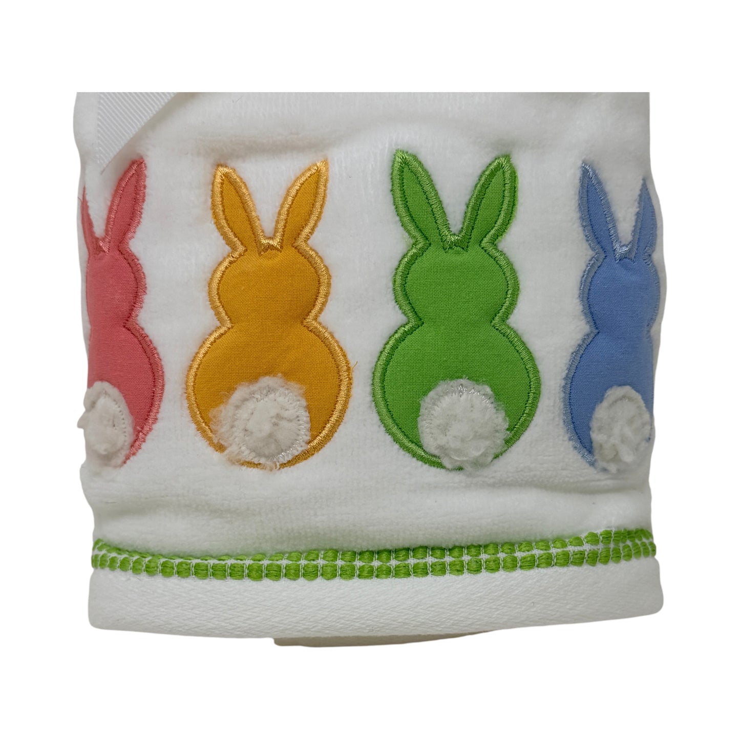 Set of two white cotton hand towels featuring colorful bunny appliqués with pom‑pom tails by Caro Home