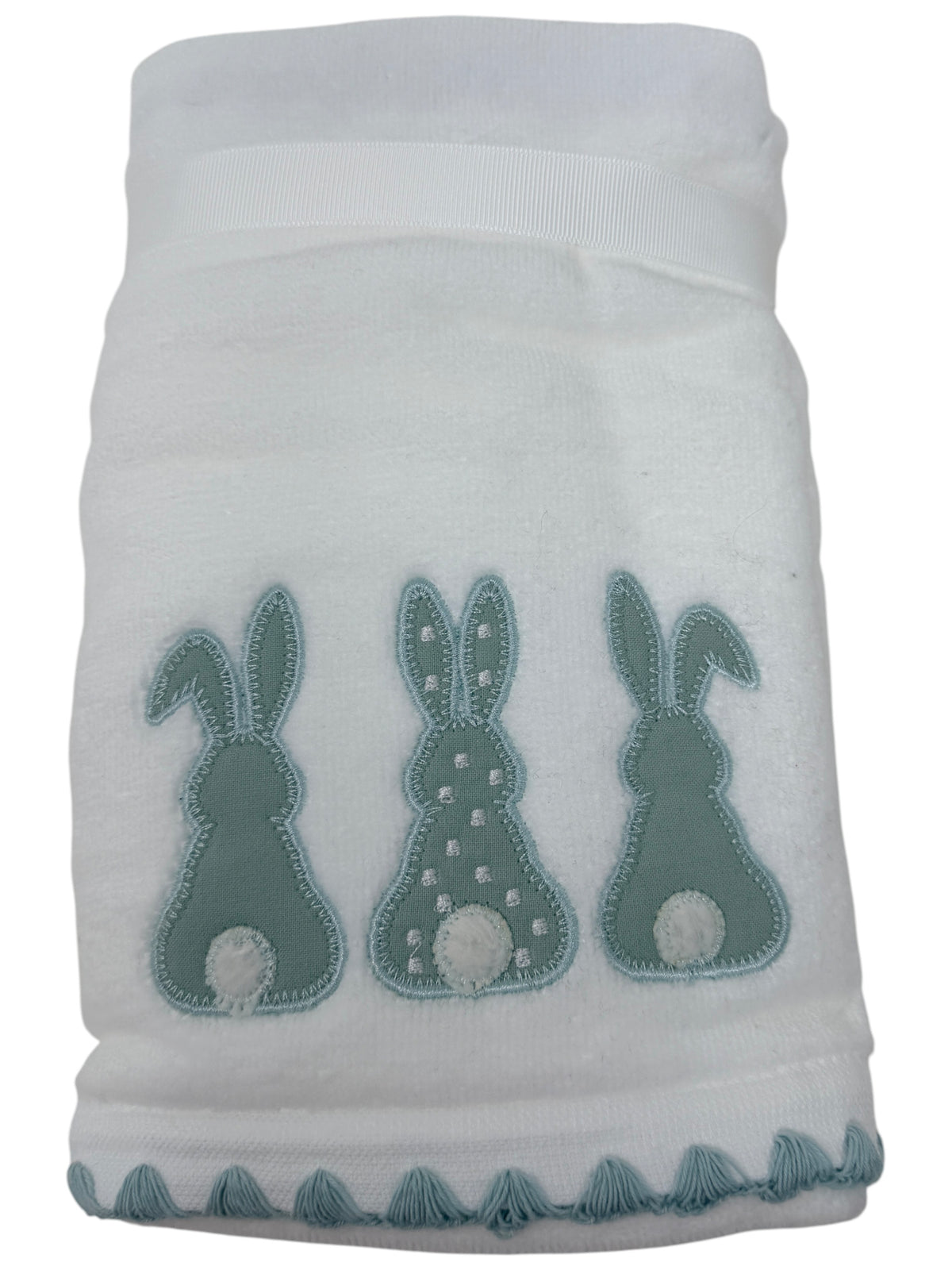 Set of two white hand towels featuring blue applique bunnies with white cotton tails and scalloped border by Caro Home