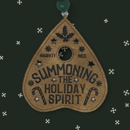 Summoning the holiday spirit. Wood ornament