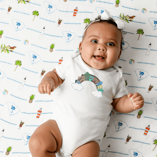 Charleston Rainbow , South Carolina Newborn Gift Bundle: Swaddle, Bib & Onesie