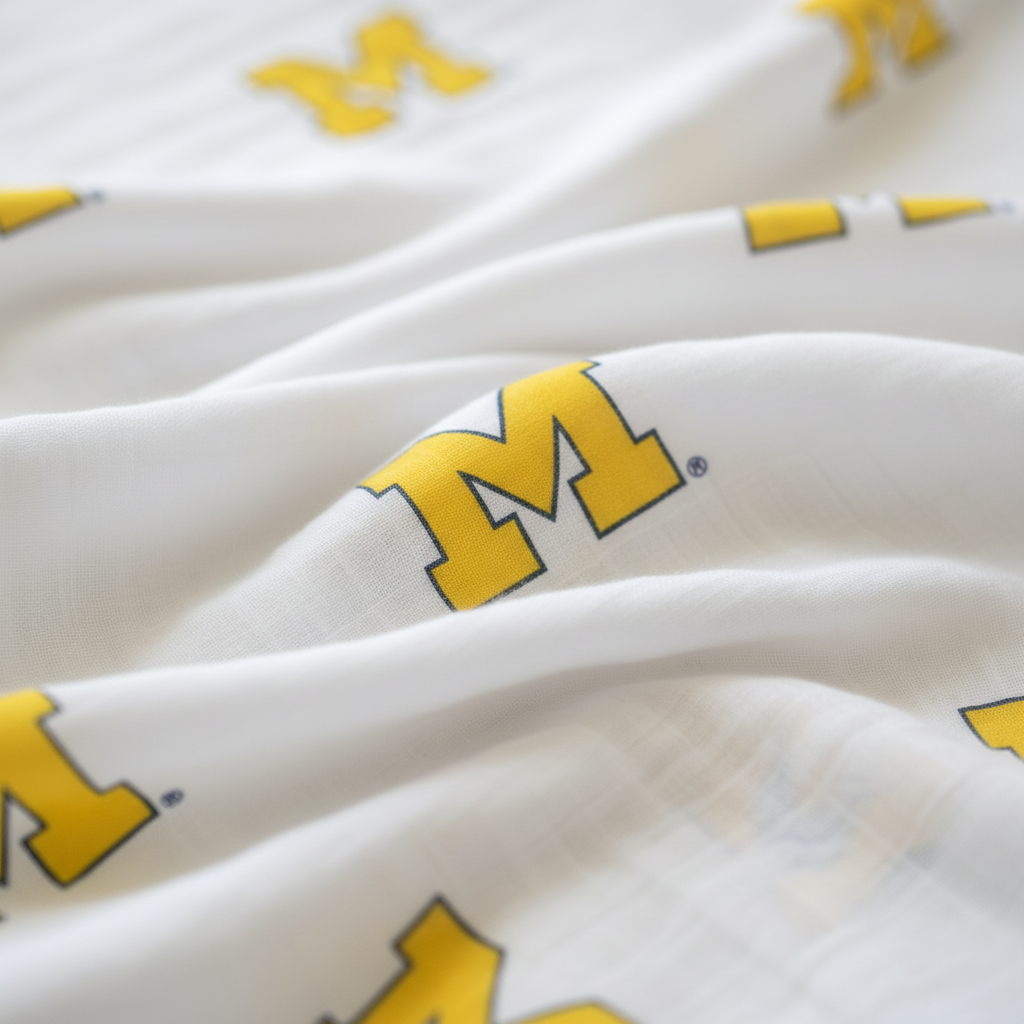 University of Michigan Wolverines Muslin Swaddle Blanket ā Premium 100% Cotton 47x47 ā Officially Licensed U of M Baby Gift