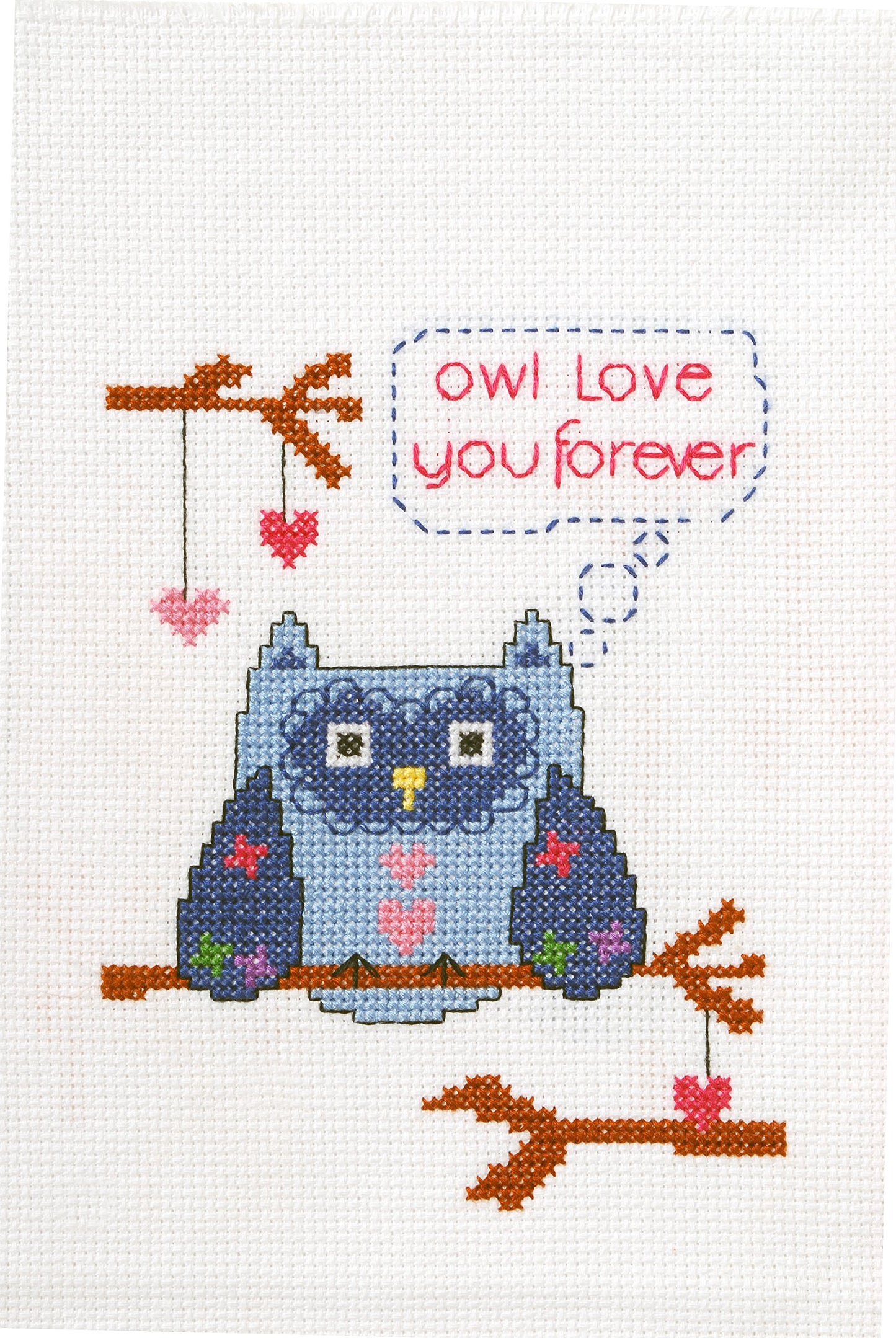 A cross stitch kit image featuring an owl with the phrase 'Owl love you forever' and various heart shapes.