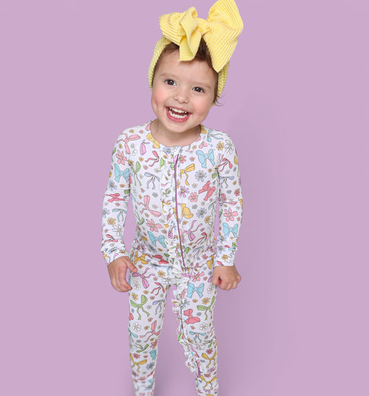 BOW GARDEN DREAM RUFFLE ROMPER