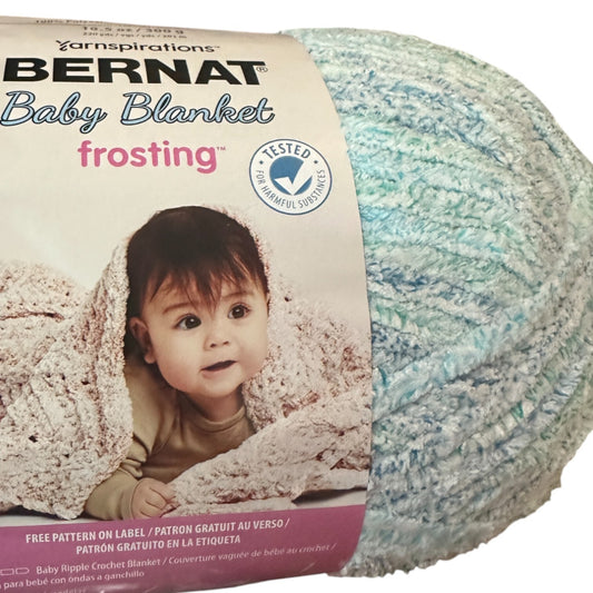 Bernat Baby Blanket frosting yarn with a baby on the packaging
