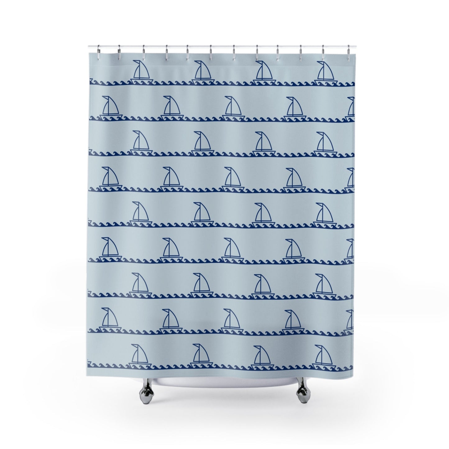Shower curtain with blue sailboat pattern on a light blue background