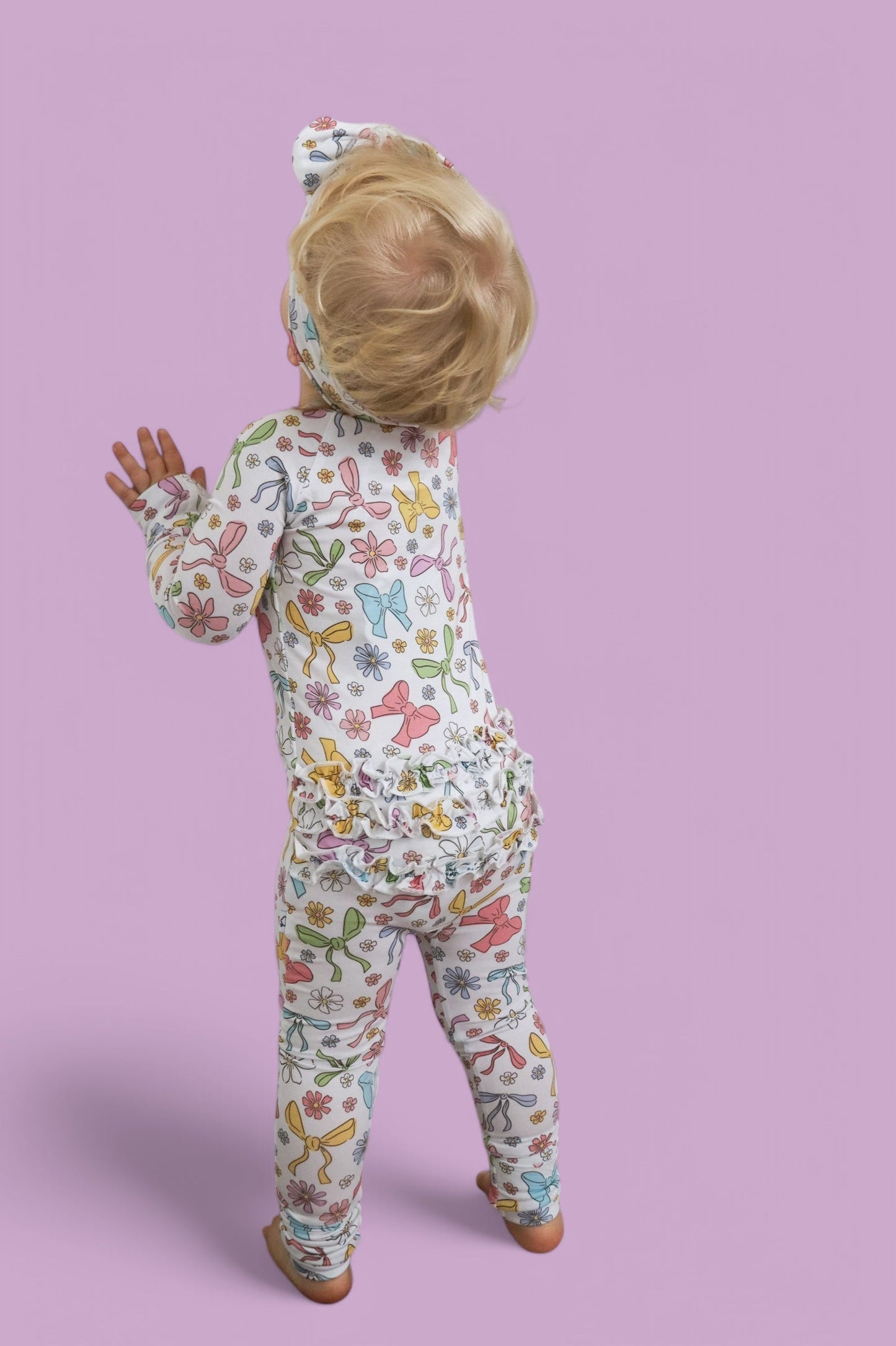 BOW GARDEN DREAM RUFFLE ROMPER