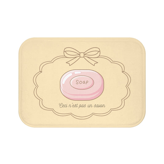 René Magritte 'Ceci n'est pas un savon' Bath Mat, NEUTRAL | Surrealist Humor Decor