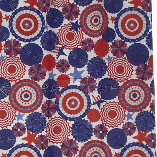 Patterned paper napkin with red, white, and blue geometric shapes on a white background