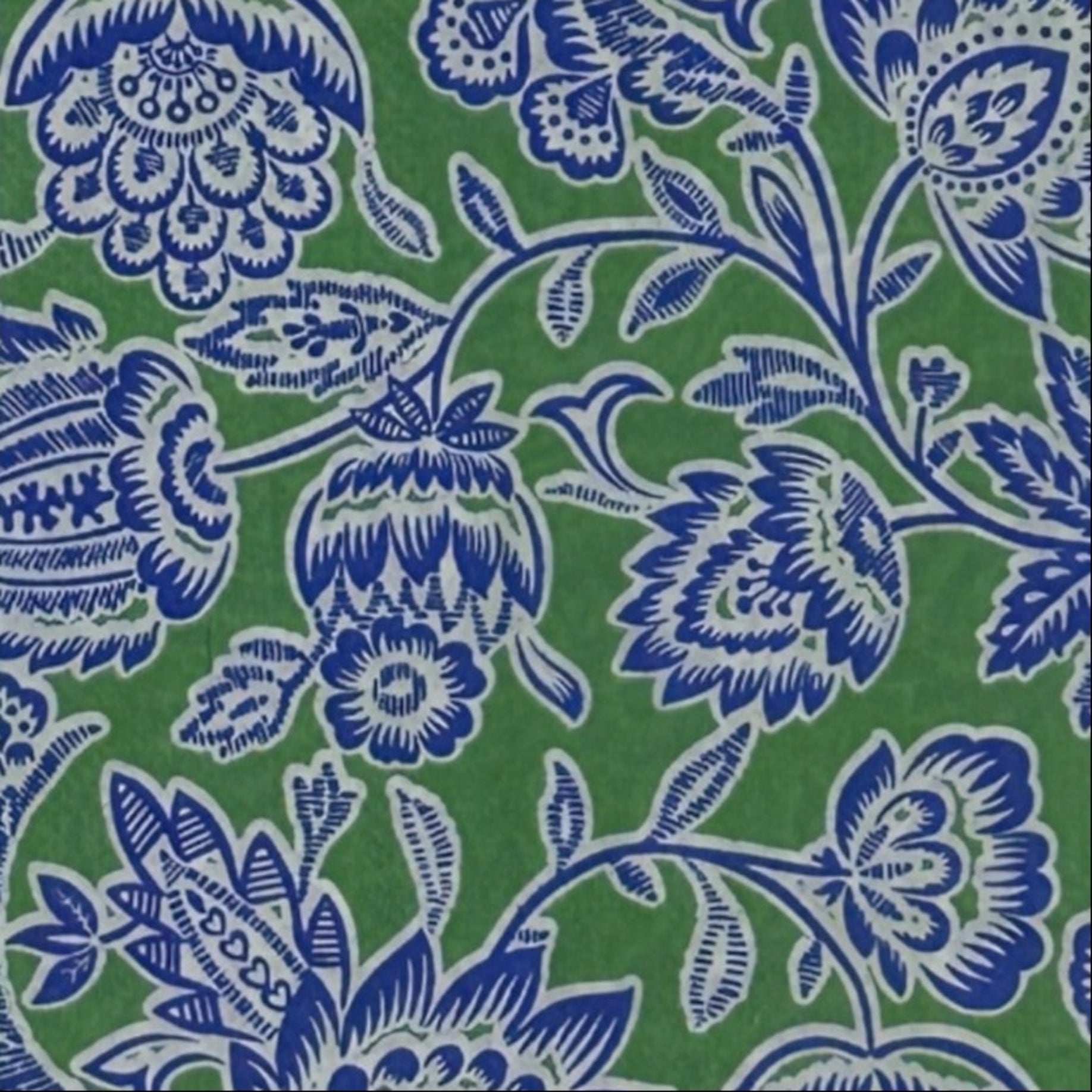 Green background with blue and white floral design