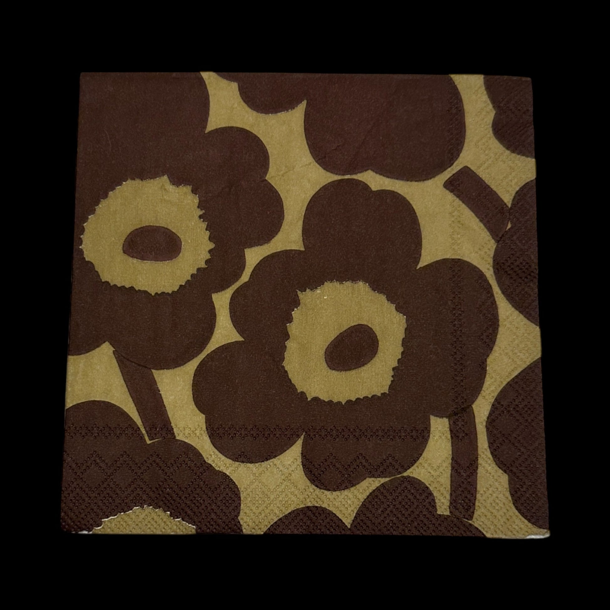 Cocktail size decoupage napkin featuring bold brown floral pattern on golden linen background, ideal for fall crafts, journaling, and decoupage art.