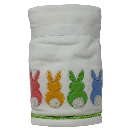 Set of two white cotton hand towels featuring colorful bunny appliqués with pom‑pom tails by Caro Home