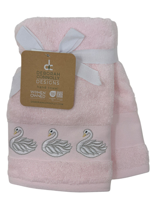 Set of two light‑pink hand towels with white embroidered swans by Deborah Connolly Designs, cotton‑lyocell blend