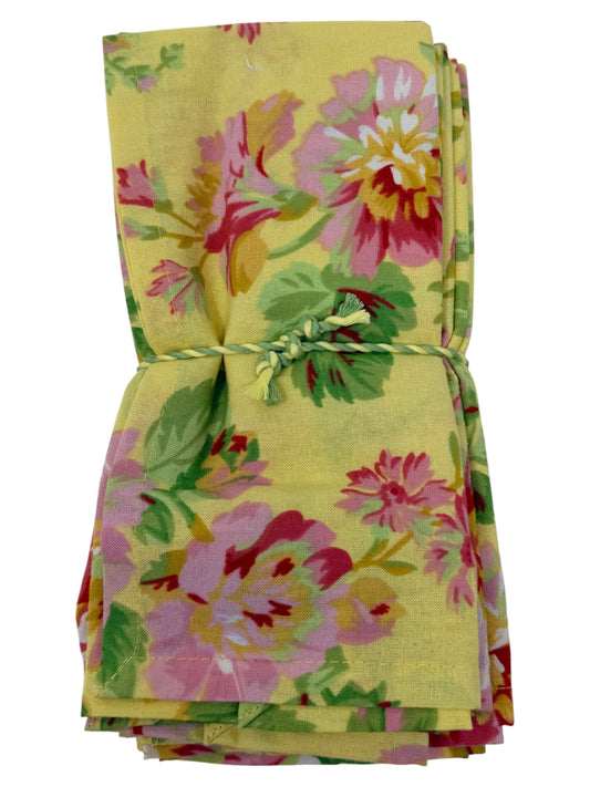 Set of twelve April Cornell yellow cotton napkins with pink red and green vintage floral design