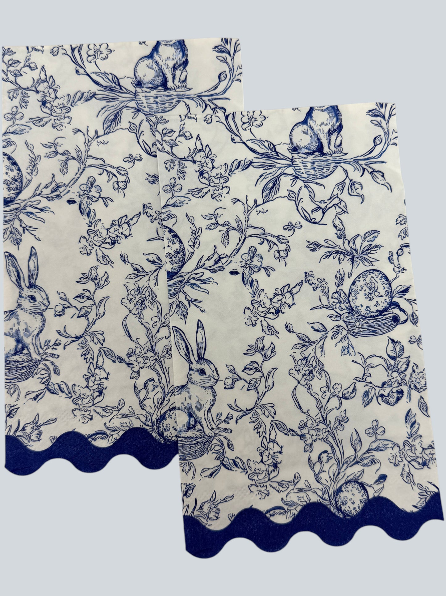Blue toile bunny Easter guest napkin with floral branches, scallop edge, and classic toile pattern by Surrey & Selena