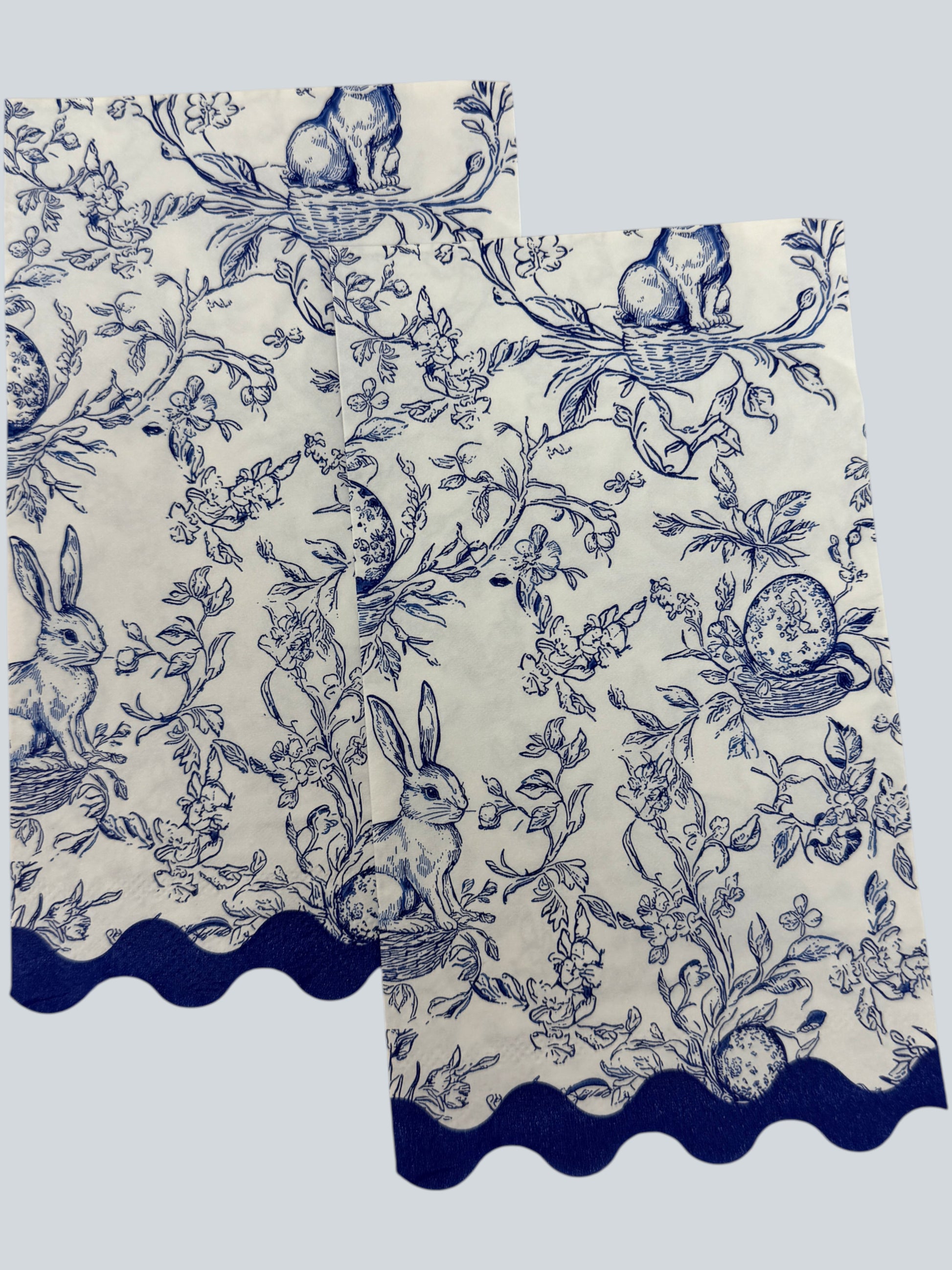 Blue toile bunny Easter guest napkin with floral branches, scallop edge, and classic toile pattern by Surrey & Selena