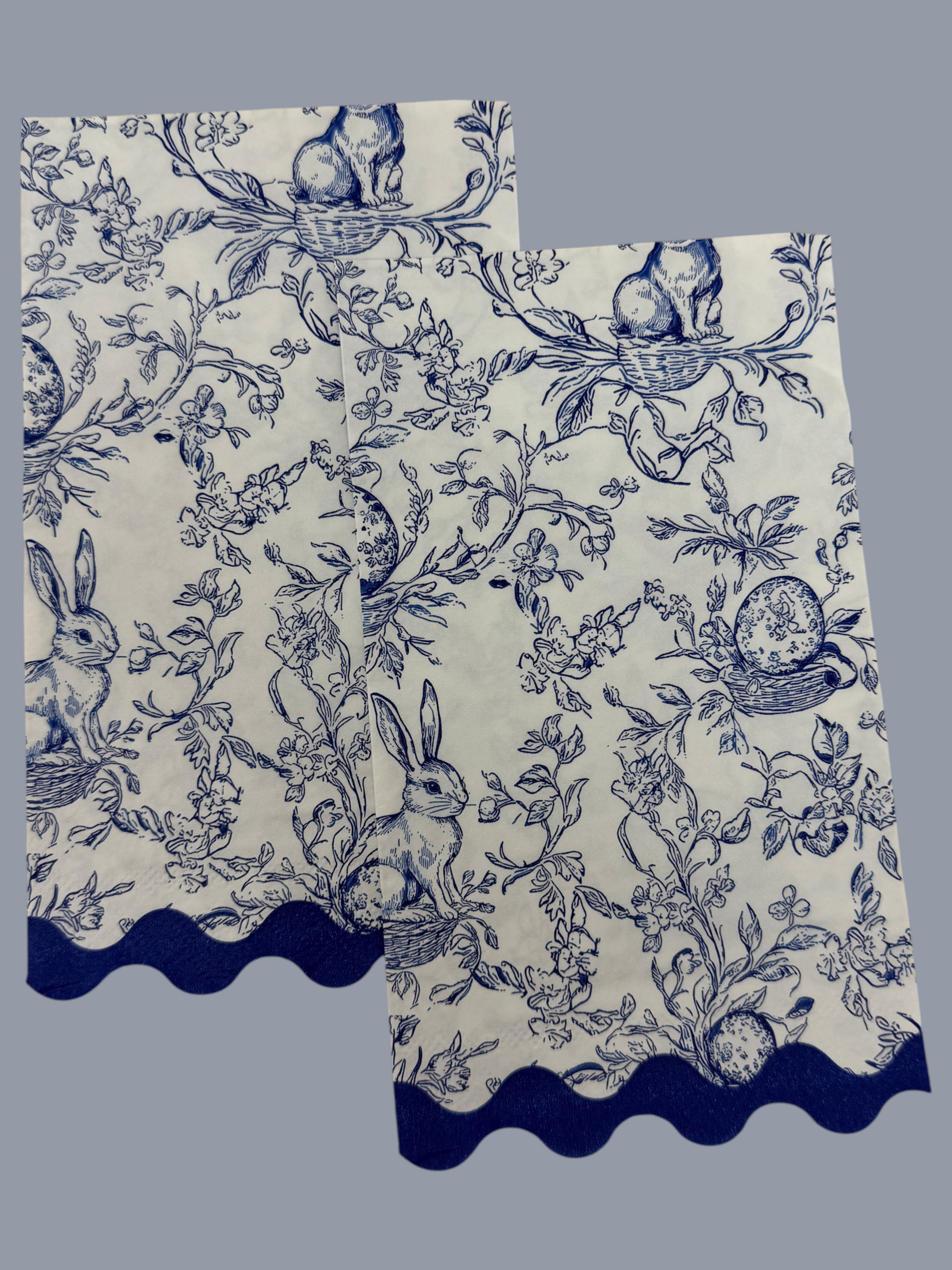 Blue toile bunny Easter guest napkin with floral branches, scallop edge, and classic toile pattern by Surrey & Selena