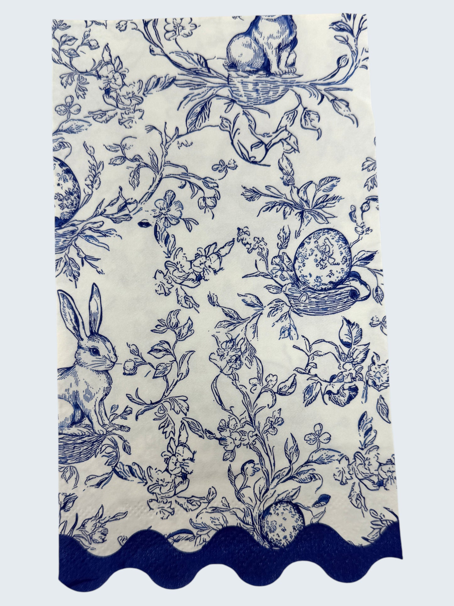 Blue toile bunny Easter guest napkin with floral branches, scallop edge, and classic toile pattern by Surrey & Selena