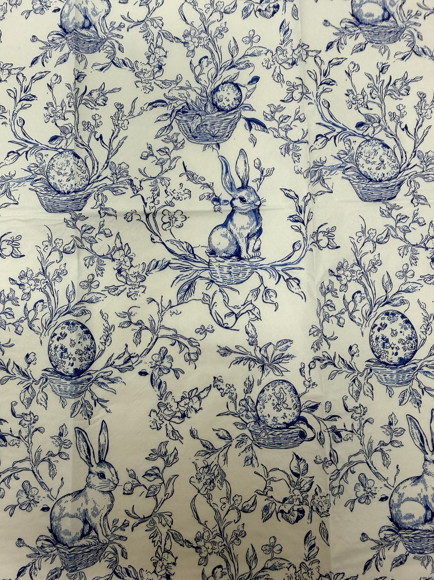 Blue toile bunny Easter guest napkin with floral branches, scallop edge, and classic toile pattern by Surrey & Selena