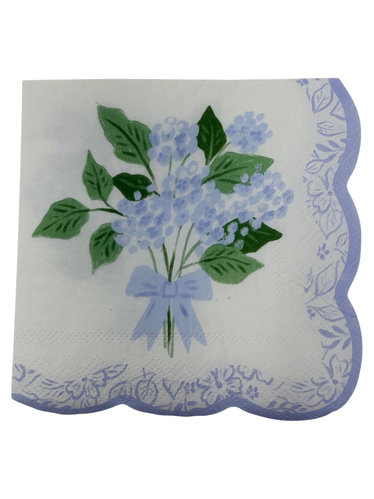 Blue hydrangea scallop edge cocktail napkin with light blue flowers, leafy greens, and floral border