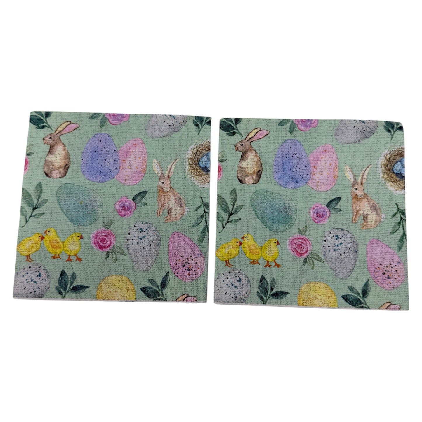 Pastel Easter cocktail napkin featuring bunnies, chicks, eggs, and floral designs on mint green background