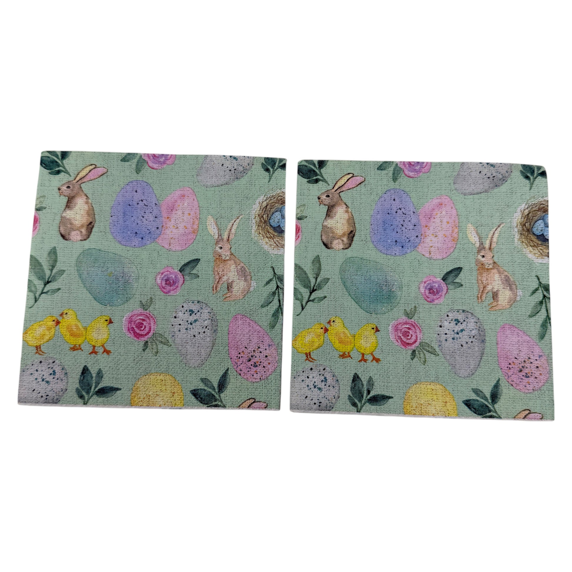 Pastel Easter cocktail napkin featuring bunnies, chicks, eggs, and floral designs on mint green background