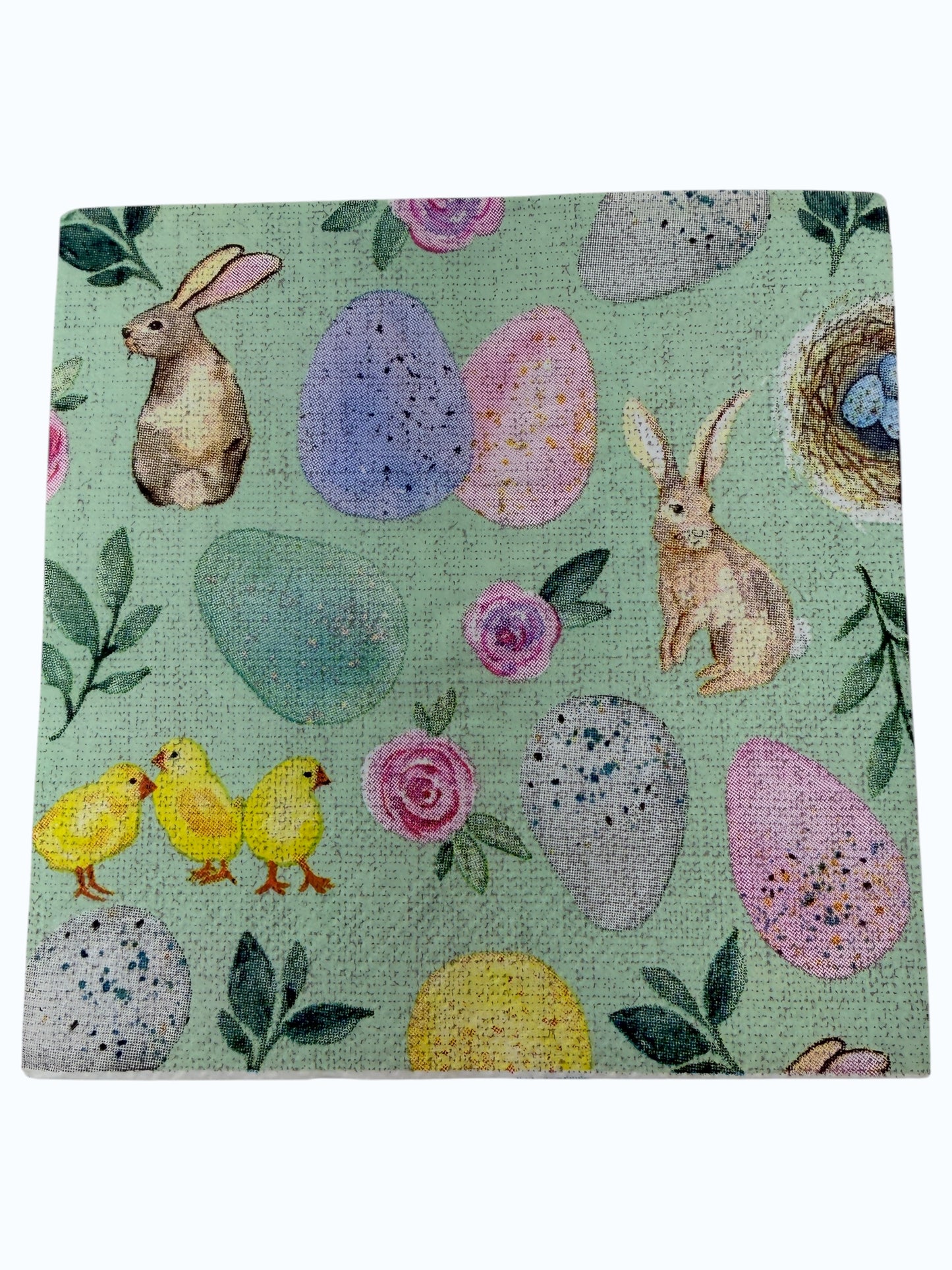 Pastel Easter cocktail napkin featuring bunnies, chicks, eggs, and floral designs on mint green background