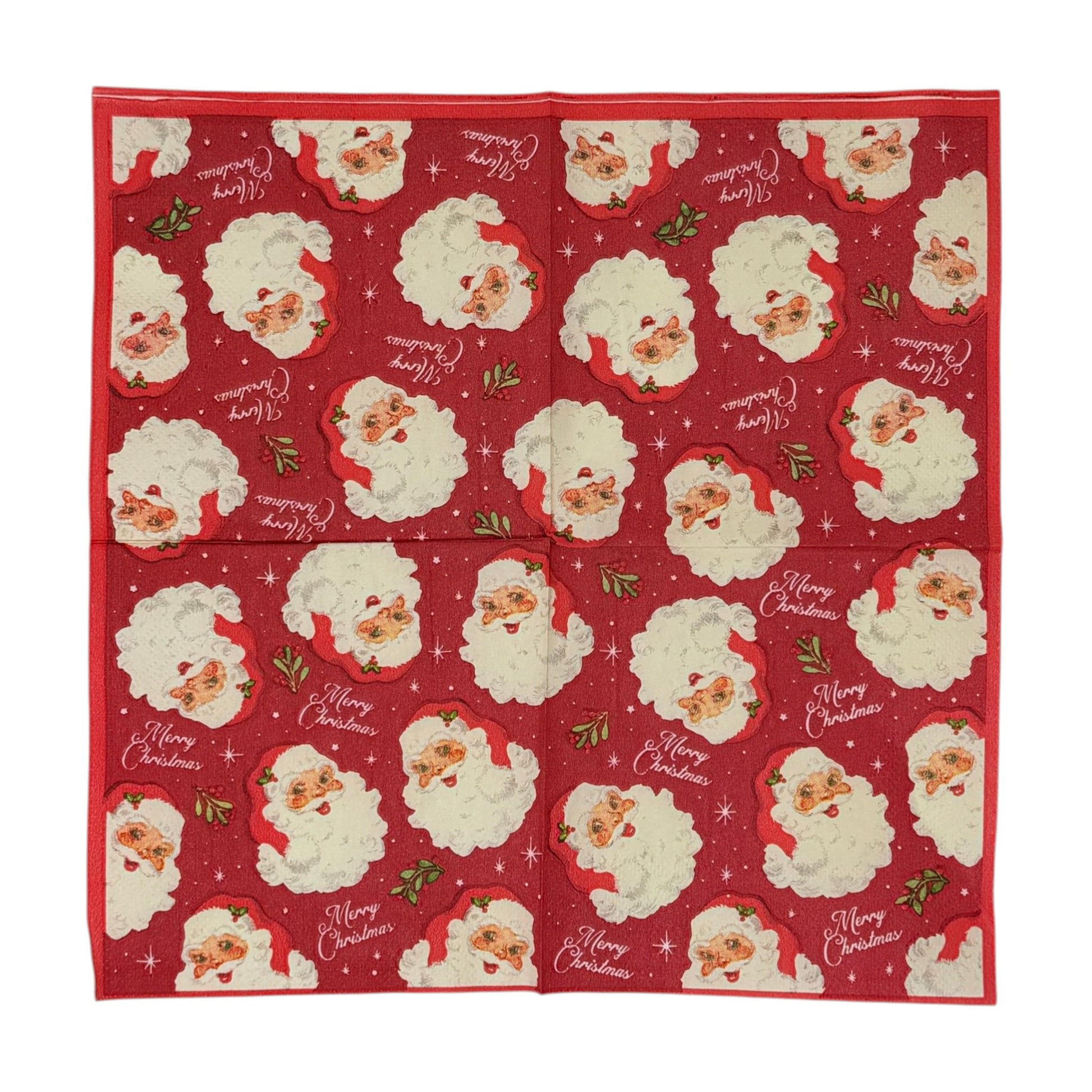 Cocktail size decoupage paper napkin featuring multiple jolly vintage Santa face portraits with fluffy white beards and red hats scattered across a deep crimson background with holly sprigs sparkling stars and Merry Christmas script set of 2