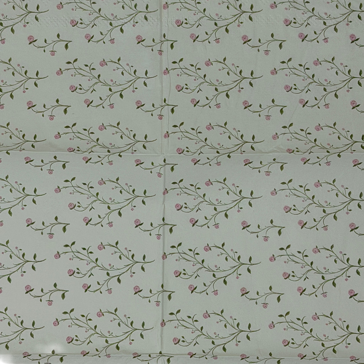 Guest size decoupage napkins featuring delicate trailing rose vine cascades with tiny blush pink rosebuds and soft olive gold leaves on a warm creamy ivory background set of 2
