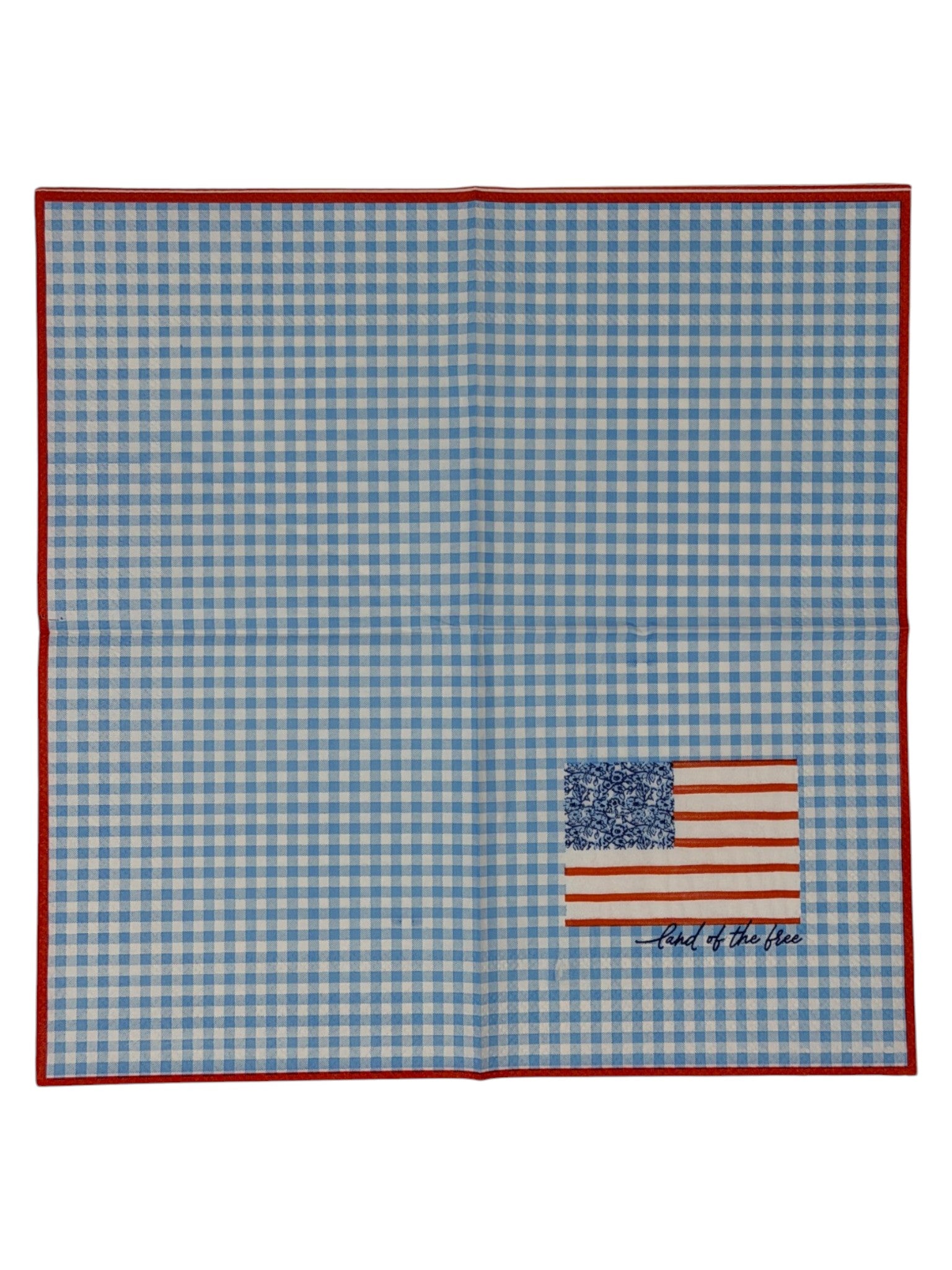 Cocktail size decoupage paper napkin featuring a stylized American flag with a blue floral botanical canton and red stripes above Land of the free cursive script on a fresh sky blue gingham background with a red border set of 2