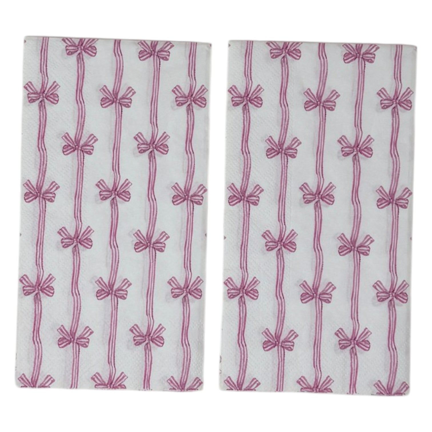 Two guest-size decoupage paper napkins featuring an all-over print of vertical wavy stripes with small striped bows tied at intervals in dusty pink and mauve on a crisp white background, photographed on a white surface.