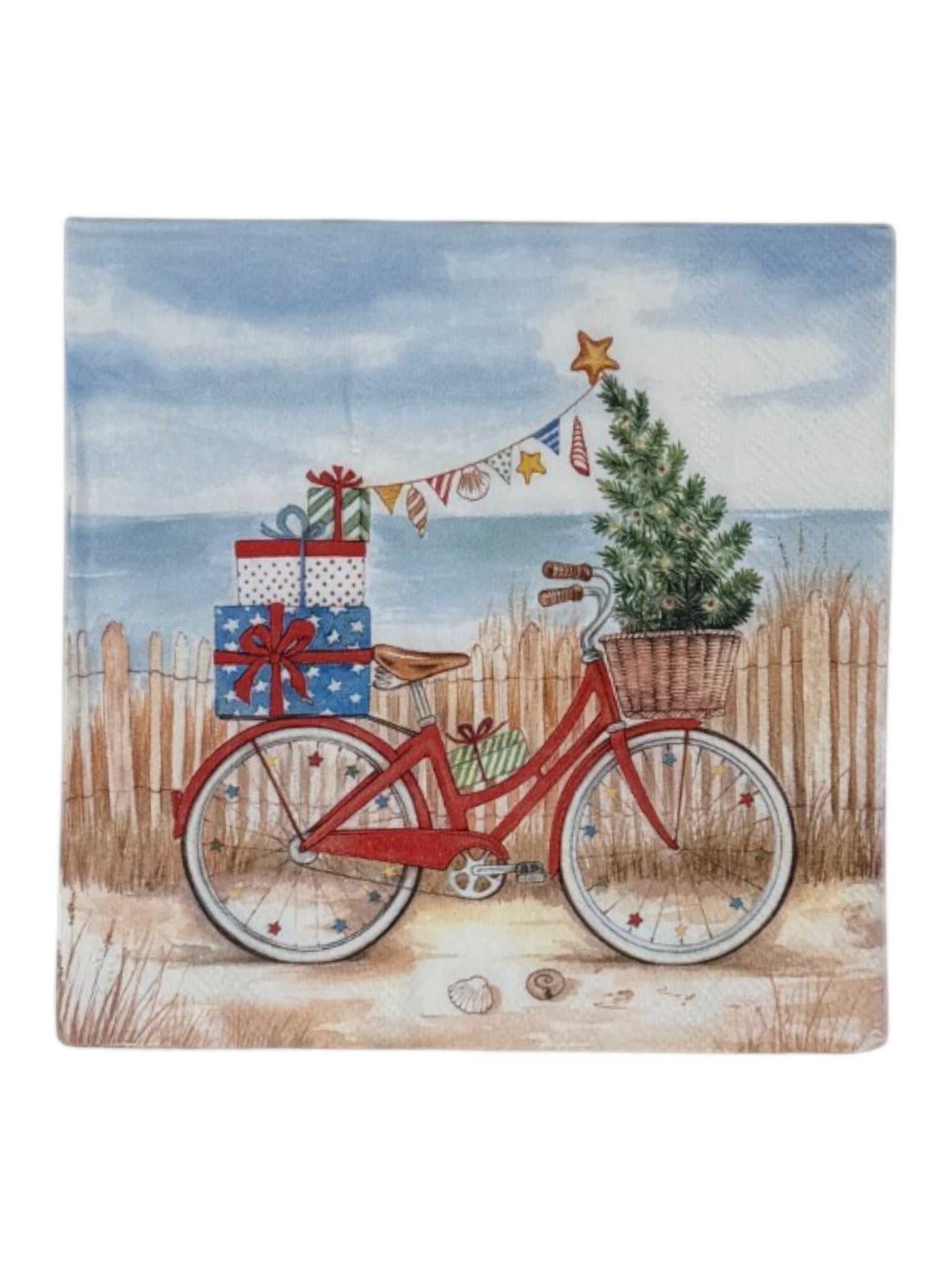 Decorative napkin with a red bicycle carrying gifts and a tree, set against a beach scene.