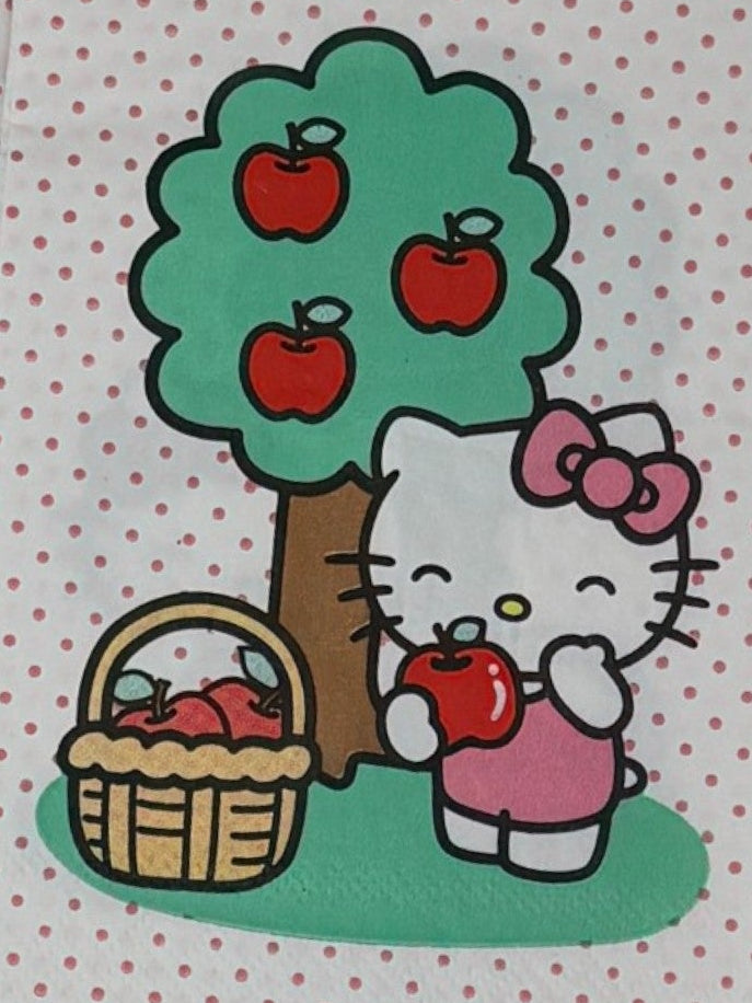 Hello Kitty holding an apple with trees and baskets of apples on a polka dot background