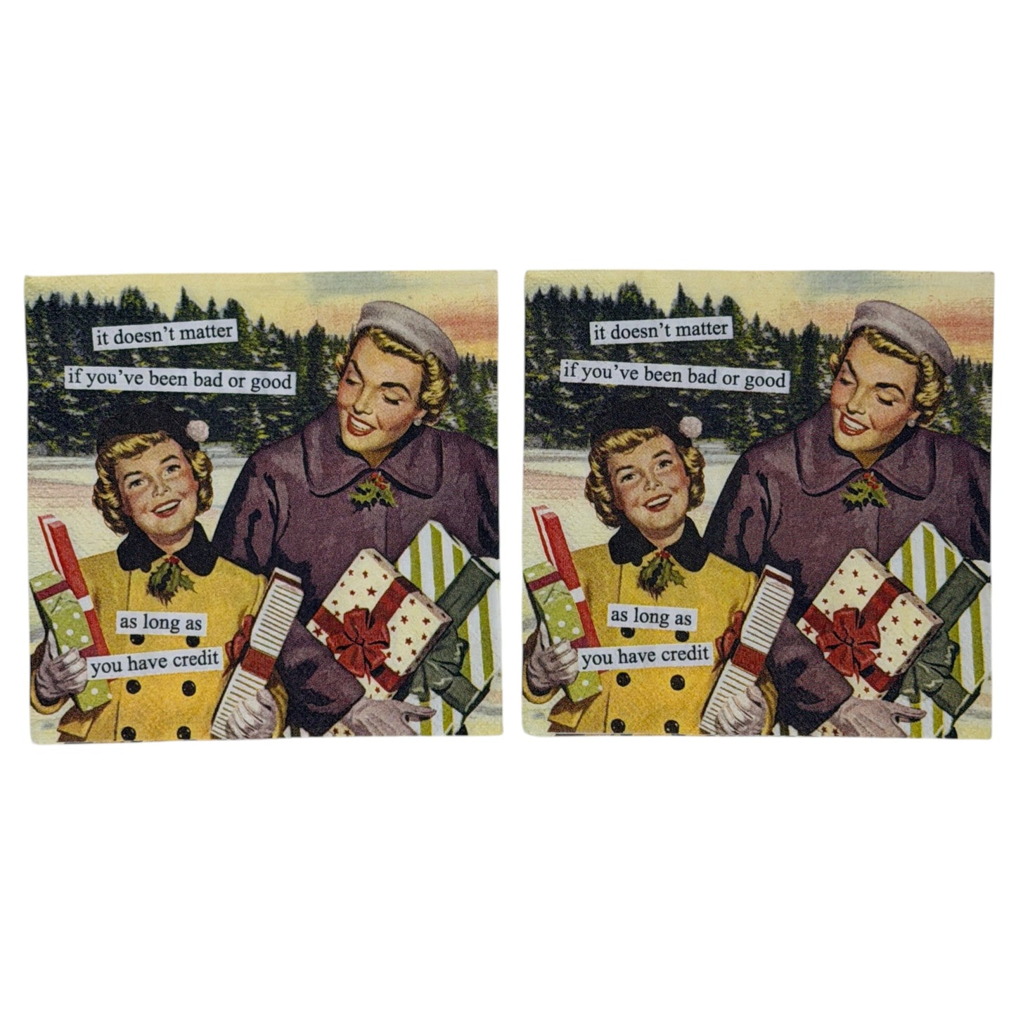 Cocktail-size decoupage paper napkin featuring a classic 1950s style illustration of two cheerful women in yellow and purple winter coats carrying colorful wrapped Christmas gifts outdoors against a snowy pine tree backdrop with a humorous cut-and-paste style caption about holiday shopping and credit, photographed on a white surface.