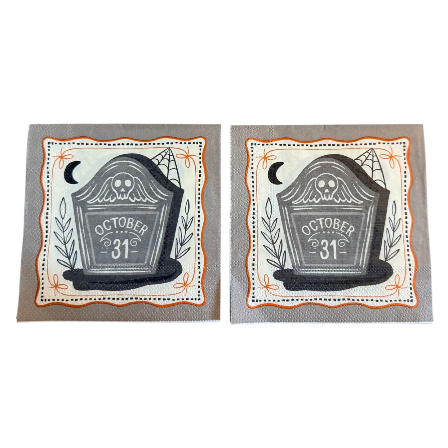 Cocktail-size decoupage paper napkin featuring a weathered grey tombstone engraved with October 31 lettering and a ghostly owl illustration with a crescent moon botanical leaf sprigs and a spider web framed by a wavy orange border with bow accents on a soft grey background, 