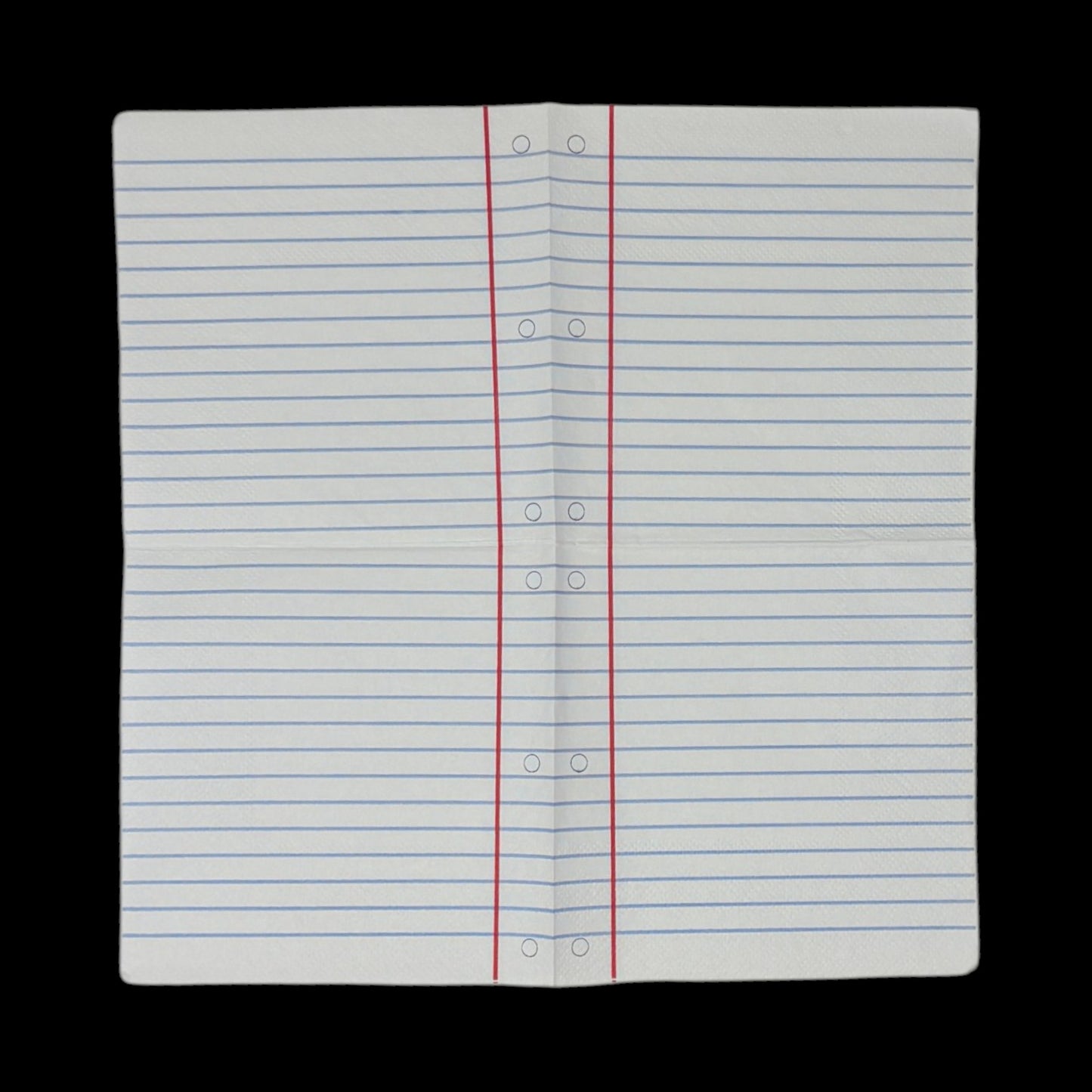 Two cocktail-size decoupage paper napkins featuring a trompe l'oeil print replicating classic wide-ruled notebook paper with blue horizontal lines a red margin line and three hole punch circles on a soft warm white background, photographed on a black surface.