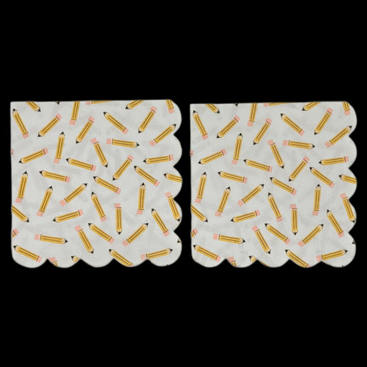 Two cocktail-size decoupage paper napkins featuring an all-over tossed pattern of classic yellow number 2 pencils with pink erasers and sharpened tips scattered in every direction on a crisp white background with a scalloped edge border, photographed on a black surface.