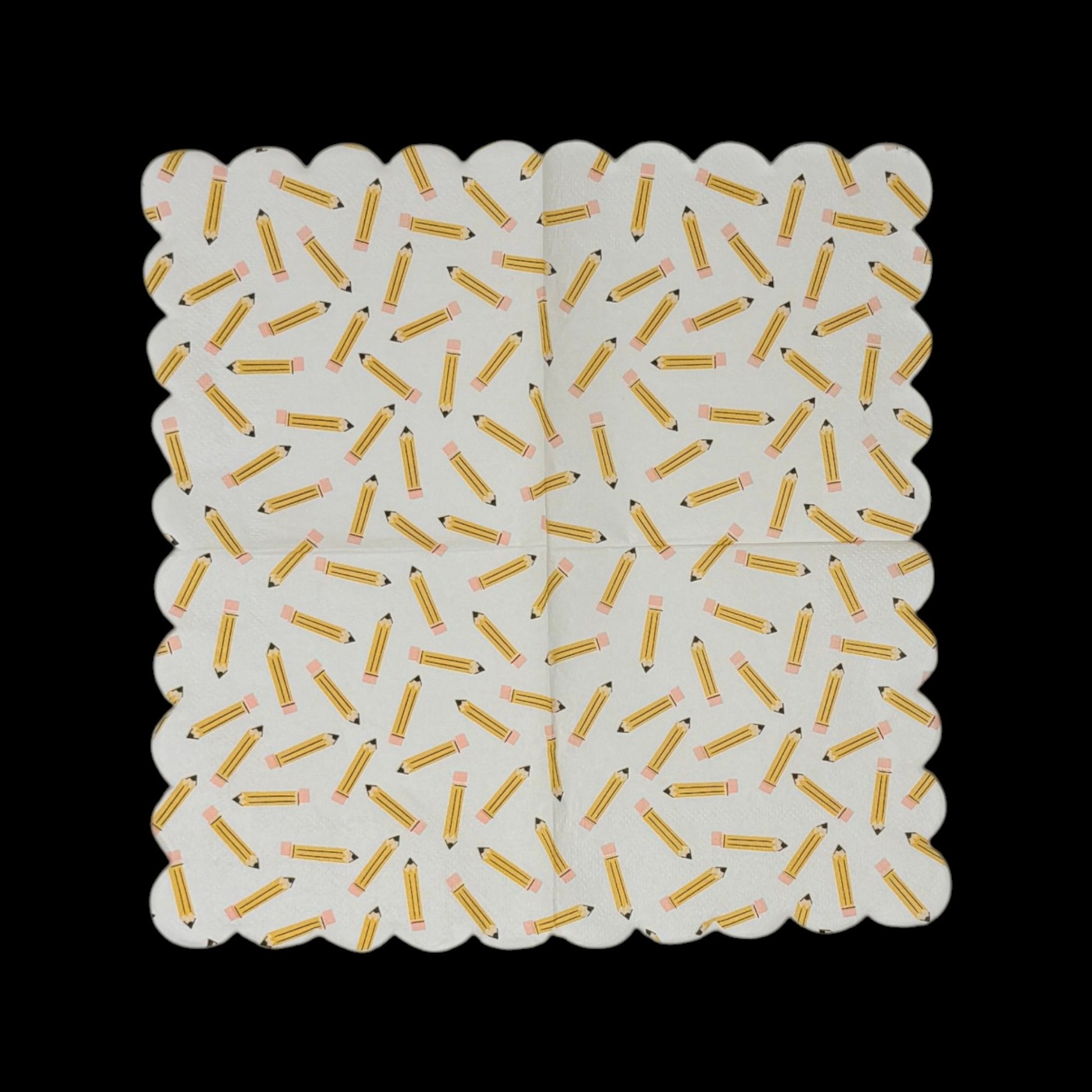 Two cocktail-size decoupage paper napkins featuring an all-over tossed pattern of classic yellow number 2 pencils with pink erasers and sharpened tips scattered in every direction on a crisp white background with a scalloped edge border, photographed on a black surface.