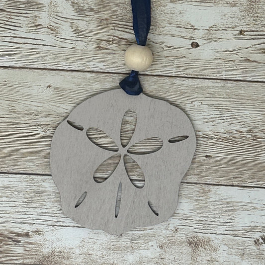 The Seashore Treasure Sand Dollar Journey to Enlightenment Wood Story Ornament