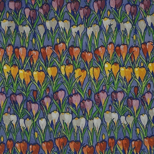 Patterned napkin with colorful tulip design on a dark background