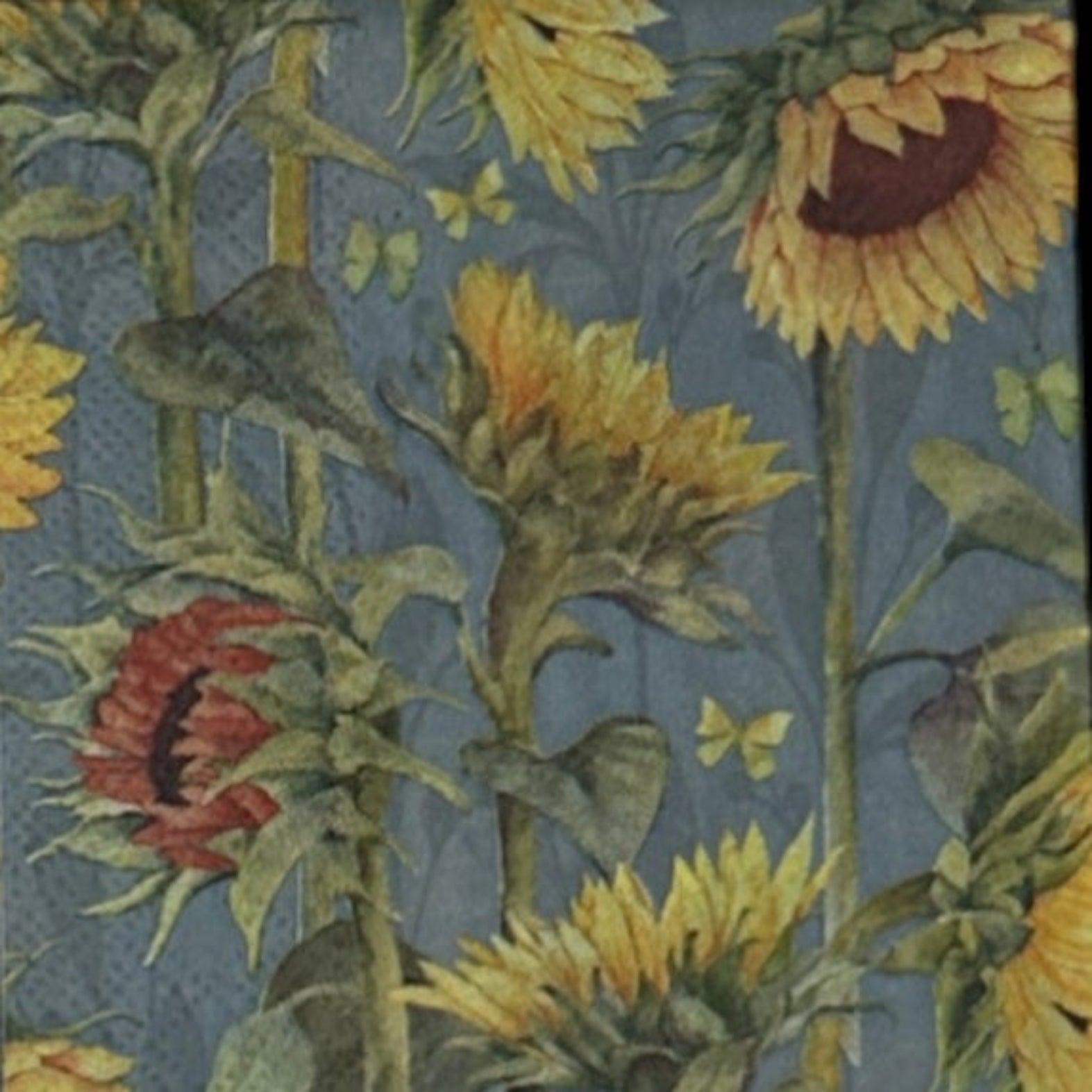 guest size decoupage napkins featuring towering golden sunflowers with burgundy and purple centers against a dusty blue grey background with green leaves and tiny chartreuse butterflies set of 2