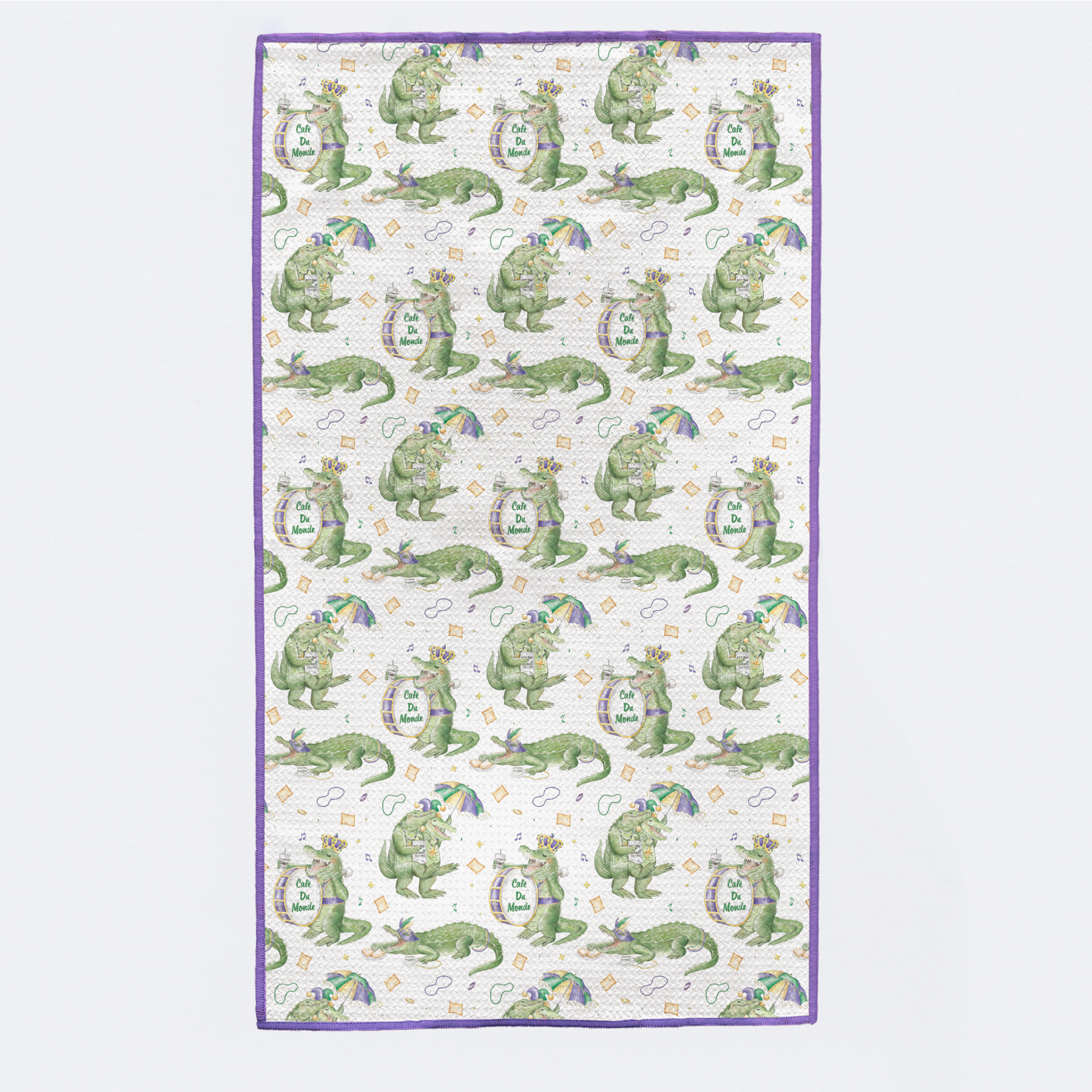 Patterned fabric with green alligator design on a white background
