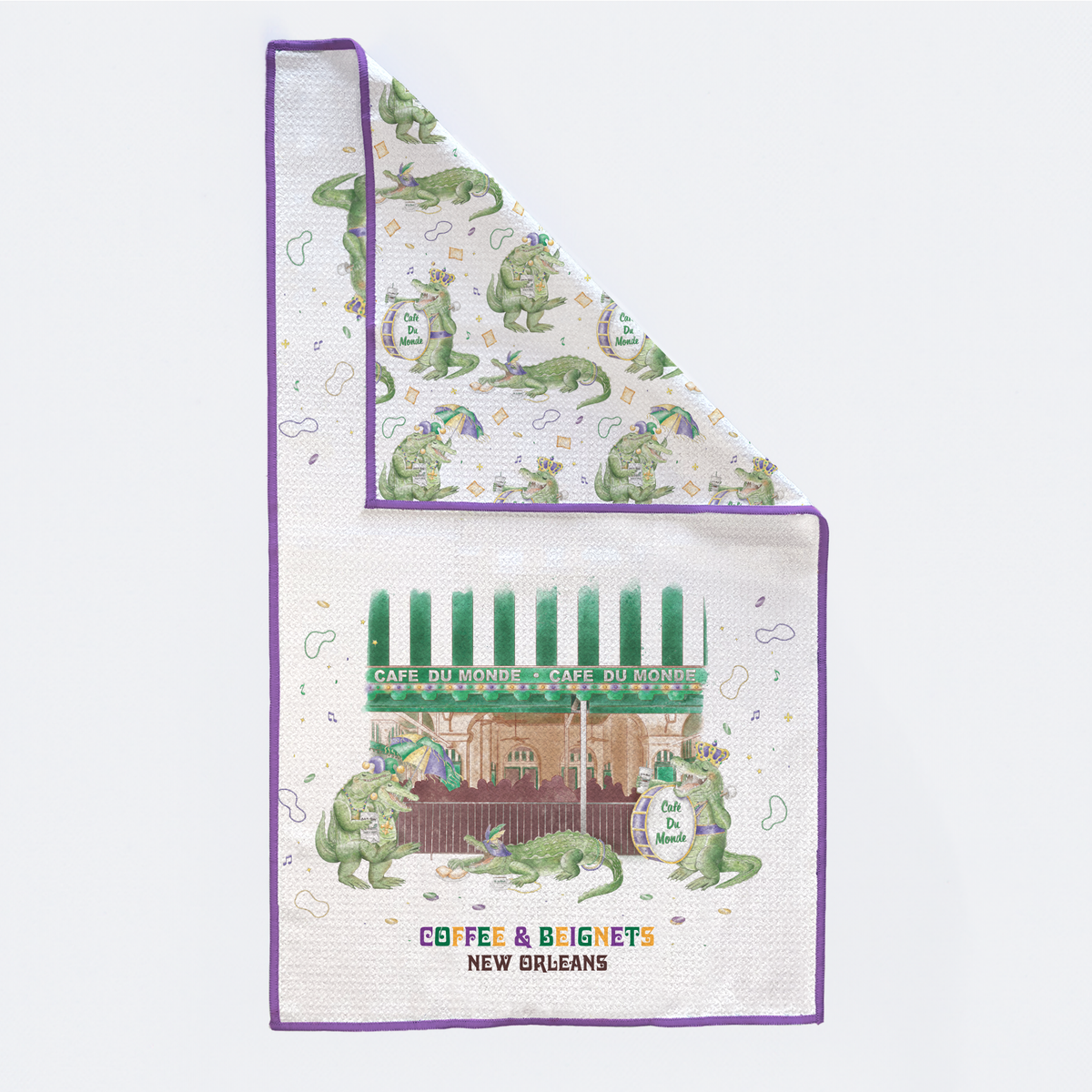 Café du Monde-themed kitchen towel with alligator design on a white background