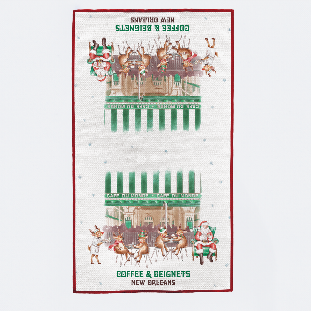 Tea towel with a festive design of a café, reindeer, and Santa Claus on a white background.