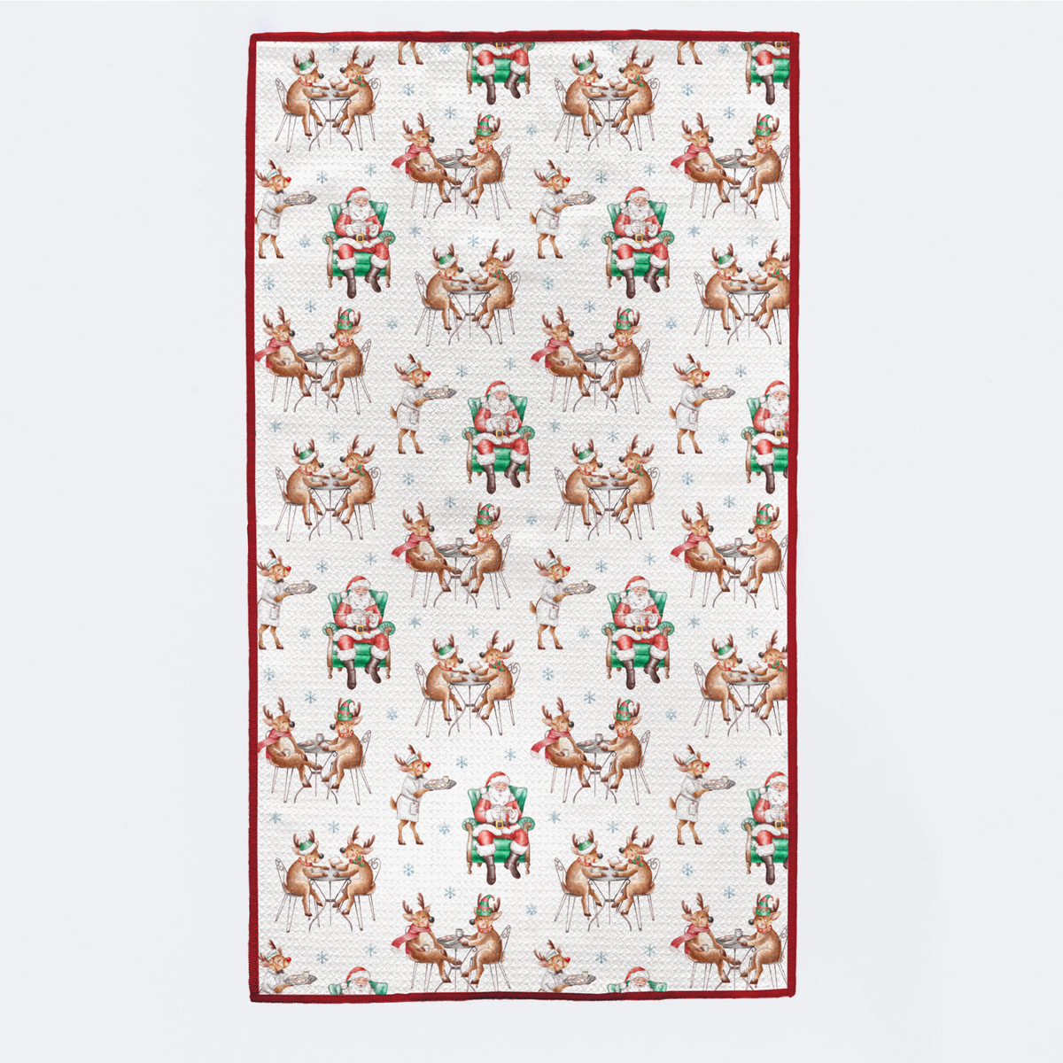 Patterned fabric with reindeer and Santa Claus design on a white background