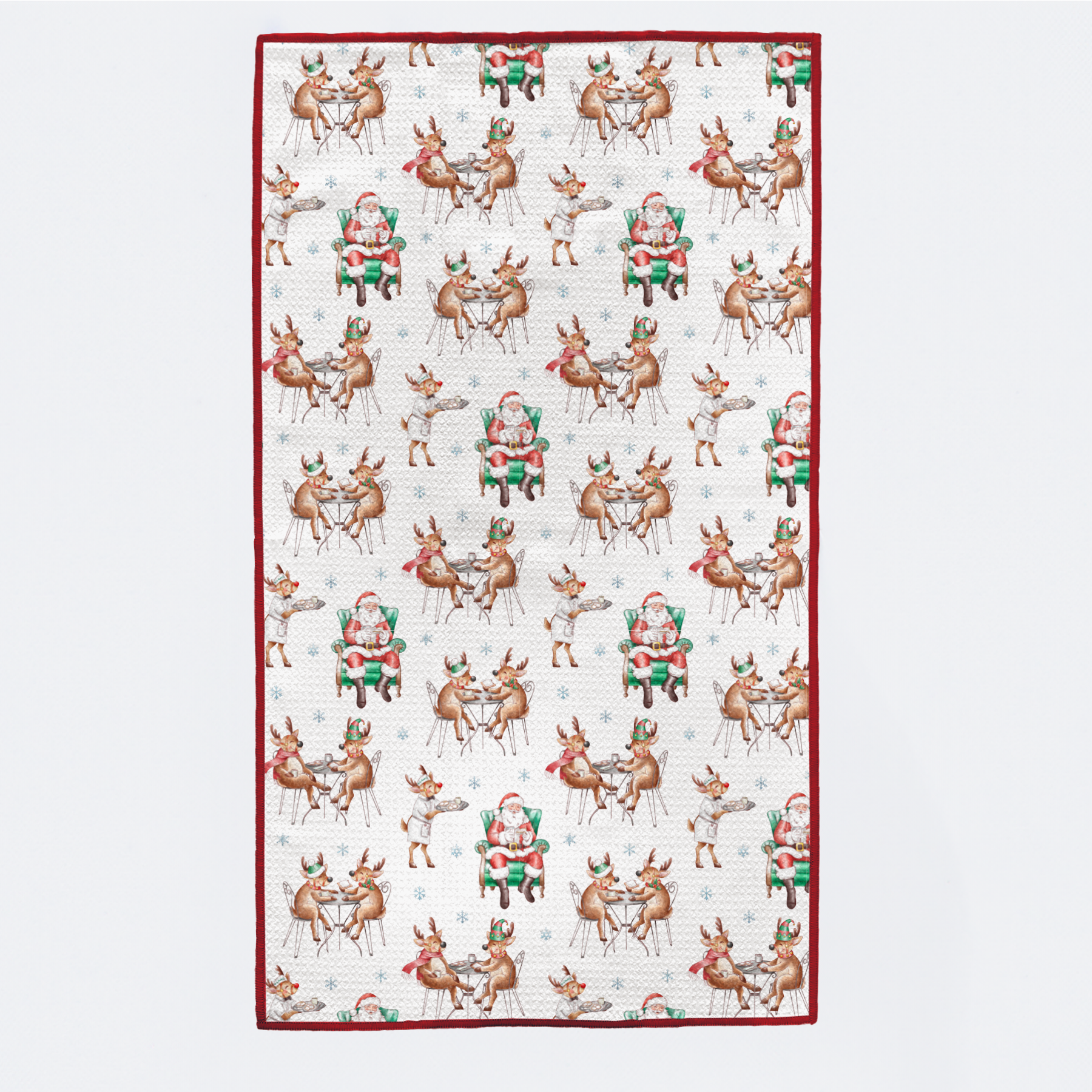 Patterned fabric with reindeer and Santa Claus design on a white background
