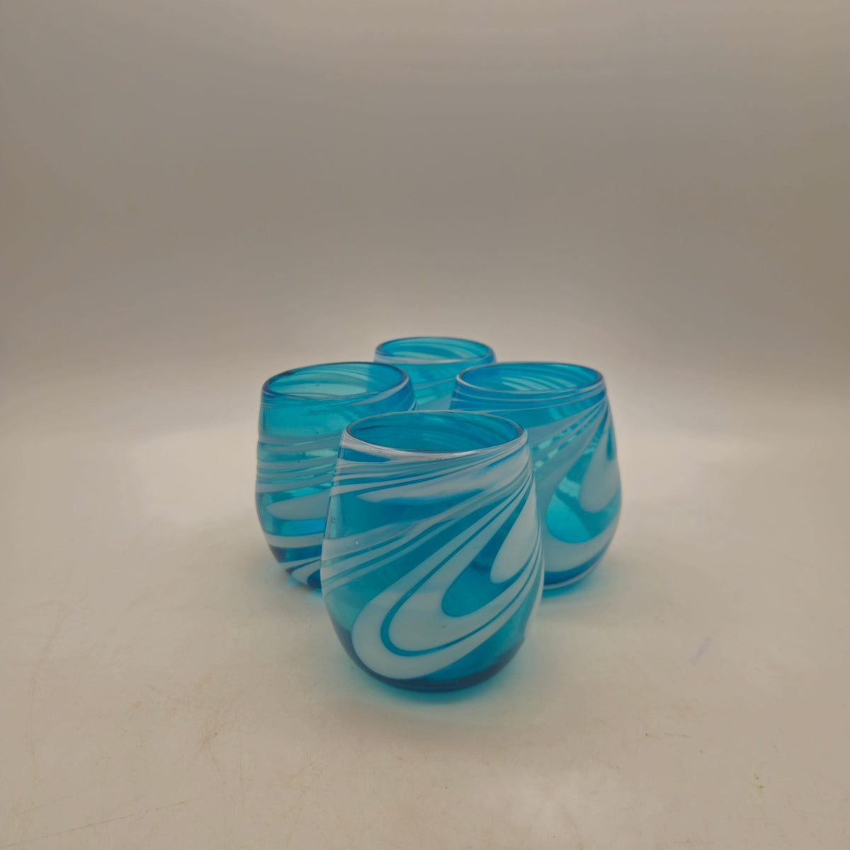 Hand-Blown Mexican Stemless Wine Glass | Teal White Swirl Design